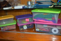 Six Plastic Boxes of Assorted Cord