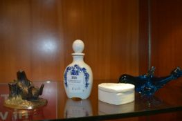 Glass Dolphin and a Reclining Beaver