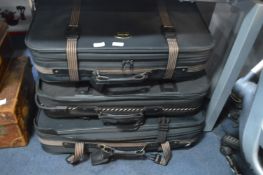 Set of Three Black Carlton Suitcases