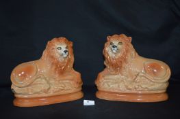 Pair of Staffordshire Lions