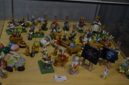 Large Collection of Painted Wooden Rabbits