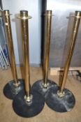 Four Restaurant Rope Barrier Posts