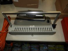 Comb Binder and a Hole Punch