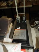 Commercial Hole Punch and a Scanner