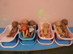 *4 Baby Carriers & 6 Dolls
