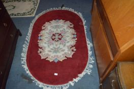 Red & Floral Oval Rug