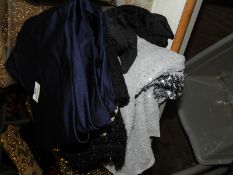 Roll of Black & Gold Sequin Fabric