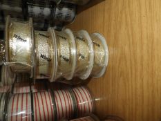 Five Rolls of Gold Metallic Ribbon