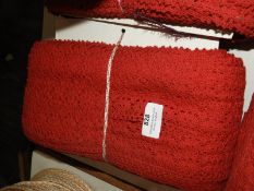 Roll of Red Crocheted Fabric