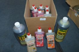 *Eleven Bottles of Liquid Carp Feed