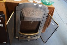 Cast Iron Fire Place and a Brass Fire Screen