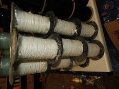 Three Rolls of Beige Braided Thread