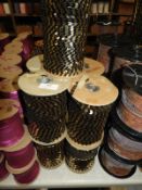 Nine Rolls of Gold & Black Sequins