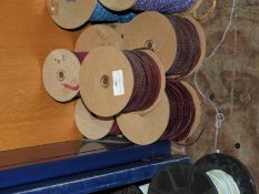 Six Rolls of Red Sequins