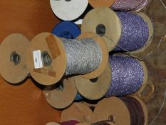 Six Rolls of Assorted Glitter Thread and Wool