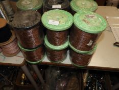 Six Rolls of Brown Braided Thread
