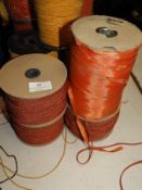 Three Rolls of Terracotta Braid and a Roll of Oran