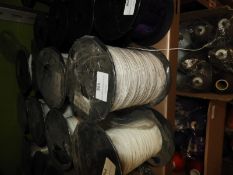 Four Rolls of White Braided Thread