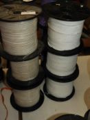 Six Rolls of Off-White and Clear Sequins