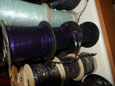Six Rolls of Miniature Purple Sequins