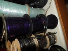 Six Rolls of Miniature Purple Sequins