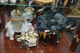 Four Assorted Elephants Including One with Buddha