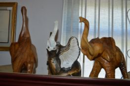 Two Carved Wood Elephants and One Other