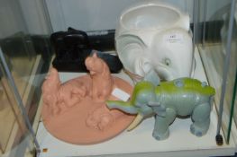 Collection of Four Elephants Including a Door Wedg