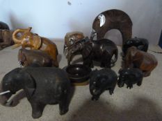 Twelve Assorted Wooden Elephants