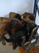 Wood Mounted Brass Elephant Hook and Six Wooden El