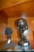 Figure of Atlas Holding up a Globe, and a Cast Iro