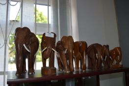 Seven Carved Wood Elephants