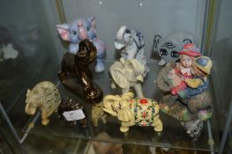 Eleven Assorted Elephants Including Carved Soapsto