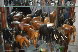 Eleven Carved Wooden Elephants