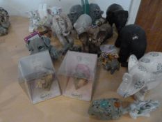 Two Sets of Elephant Bookends and a Quantity of As