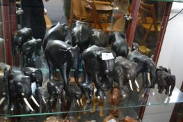 Twelve Black Elephants Including Some Carved Ebony