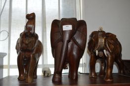 Three Large Carved Wooden Elephants