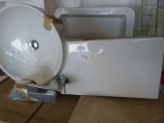 *Circular Sink with Chrome Tap