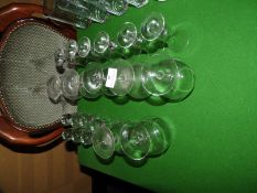 *Seven Shot Glasses, Seven Brandy Glasses, and Six