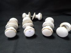 Four Pairs of Porcelain Door Handles and One Other