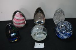Six Glass Paperweights