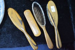Four Vintage Clothes Brushes