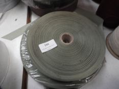 One Roll of Elastic and One Roll of Green Ribbon