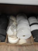 Box Containing White Felt Fabric and Shoulder Pads