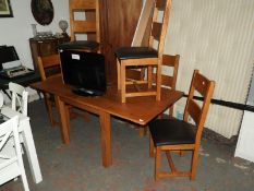 Extending Oak Dining Table and Six Solid Oak Chair