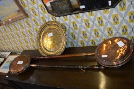 Two Copper Bed Warmers and an Ornate Brass Tray