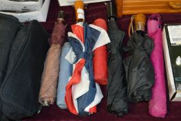 Seven Folding Umbrellas