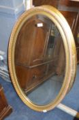 Gilt Framed Oval Bevelled Edge Wall Mirror