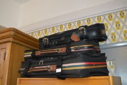 Three Canvas Suitcases