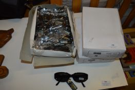 Four Boxes of Sunglasses